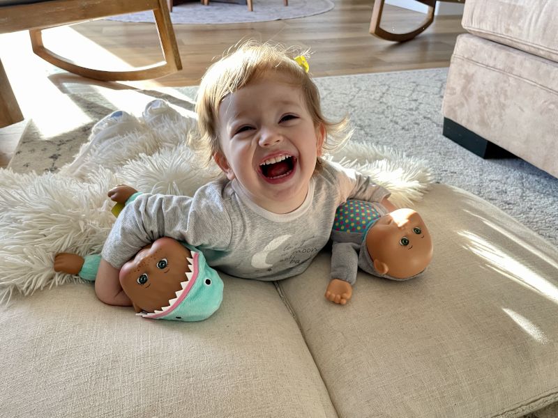 Collette Having Fun with Her Dolls